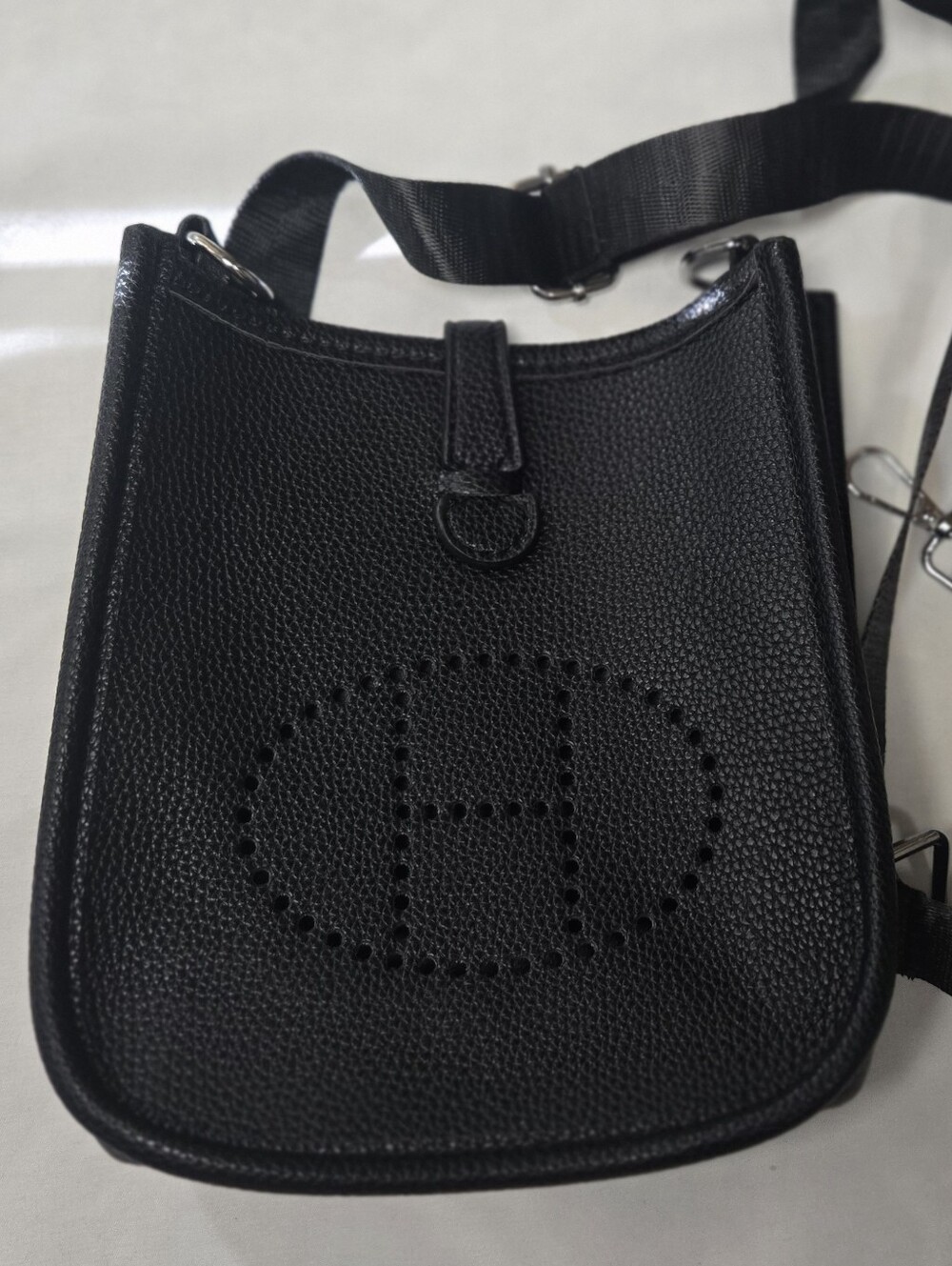 Pebbled Black Leather Crossbody with Perforated Oval Detail